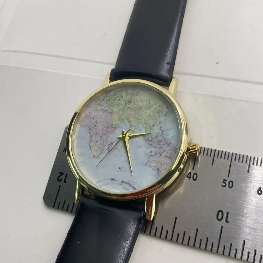 Womens Gold Tone World Map Watch New Battery